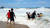 지난 12일 강원 고성군 토성면 봉포리 한 해변에서 바다에 빠진 40대 남성을 피서객들이 인간 띠를 만들어 구조하고 있다. [고성=연합뉴스]
