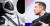 일론 머스크 CEO가 공개한 우주복(왼쪽)과 일론 머크스 CEO. [중앙포토]