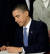 2010년 3월 버락 오바마 미국 대통령이 백악관 이스트룸에서 하원을 통과한 건강보험 개혁법안에 서명하고 있다.