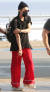 파이핑 장식이 돋보이는 파자마 팬츠로 공항 패션을 연출한 지드래곤. [사진 중앙포토]