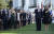 트럼프 미 대통령과 부인 멜라니 여사가 알카에다에 의해 3000여 명이 숨진 9ㆍ11 테러 16주년을 맞아 11일(현지시간) 백악관에서 거행된 추모식에 참석해 국기에 대한 경례를 하고 있다. [AFP=연합뉴스]
