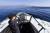 수상항해 중 함교탑에서 함교당직사관이 쌍안경을 이용해 항로상 이상유무를 확인하고 있다. [사진 해군] 