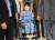 지난 8월 30일 박근혜 전 대통령이 허리 질환 치료차 서울 서초동 서울성모병원에서 진료를 받은 뒤 환자복을 입고 휠체어를 탄 채 병원을 빠져 나가고 있다. [연합뉴스]