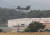 경북 칠곡군 왜관읍 캠프캐럴 미군기지에서 헬기가 장비를 매달고 성주골프장으로 향하고 있다. 프리랜서 공정식 
