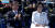 환한 문재인 대통령(왼쪽)과 걱정스런 눈빛의 김정숙 여사. [사진 유튜브 캡처]