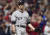 New York Yankees relief pitcher David Robertson looks back at the dugout after giving up a solo home run to Cleveland Indians&#39; Jay Bruce in the eighth inning of Game 2 of baseball&#39;s American League Division Series, Friday, Oct. 6, 2017, in Cleveland. (AP Photo/David Dermer) <저작권자(c) 연합뉴스, 무단 전재-재배포 금지>