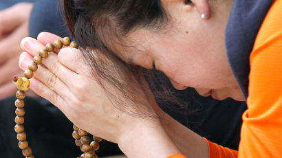 [사진] 수능 한 달 앞, 엄마의 기도