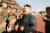 북한 김정은 노동당 위원장이 설립 70주년을 맞은 만경대혁명학원을 방문하고 교직원, 학생들과 기념사진을 찍었다고 노동신문이 13일 전했다. [연합뉴스]