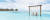 에메랄드빛 바다가 펼쳐지는 몰디브의 클럽메드 카니 리조트에서 커플이 수상 그네를 타는 모습. [사진 클럽메드]
