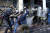 그리스 크레테 섬에 거주하는 농민들이 지난 3월 8일(현지시간) 정부의 세금 및 연금제도개혁에 항의하며 개최한 아테네 집회에서 최루가스를 사용하는 진압경찰과 충돌하고 있다.[EPA=연합뉴스]