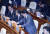 자유한국당 의원들이 1일 국회에서 문재인 대통령 시정연설 전 노트북에 ‘방송장악 저지&#39; 문구가 적힌 종이를 붙이고 있다. 임현동 기자