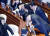 자유한국당 의원들이 1일 국회에서 문재인 대통령 시정연설 전 노트북에 ‘방송장악 저지&#39; 문구가 적힌 종이를 붙이고 있다. 임현동 기자