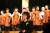 지난 4월 제주 제라진 합창단의 일본 오사카 공연에서 이애리 단장이 공연내용을 설명하고 있다. [사진 제주 제라진 합창단]