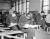 전쟁이 끝나고 얼마되지 않은 1950년대의 대학입시 풍경. 책상이 부족해 수험생들은 의자에 걸터앉아 무릎 위에 시험지를 놓고 문제를 풀었다. [국가기록원 제공=연합뉴스] 