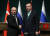 11일(현지시간) 터키 앙카라를 방문한 블라디미르 푸틴 러시아 대통령(왼쪽)이 레제프 타이이프 에르도안 터키 대통령과 정상회담 후 공동 기자회견에서 악수를 나누고 있다. [신화통신=연합뉴스] 