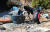 13일 오후 지진으로 피해를 본 경북 포항시 북구 흥해읍 한 주택에서 인근 주민이 철거 잔해를 정리하고 있다. [연합뉴스]
