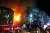 21일 충북 제천시 하소동 피트니스센터에서 불이 나 소방대원들이 화재 진압을 하고 있다. [연합뉴스]