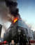 21일 오후 충북 제천시 하소동 9층짜리 스포츠센터 건물에서 화재가 발생해 29명이 사망했다. 이날 긴급 출동한 119 소방대가 지붕까지 번진 불을 끄고 있다. [연합뉴스]