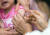 지난 9월 서울 중랑구의 한 병원 소아청소년과에서 한 어린이가 독감 예방 주사를 맞고 있다. [연합뉴스]