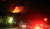 14일 오후 7시 53분께 강원 양양군 양양읍 화일리에서 발생한 산불이 주택 1채를 태우고 산 정상을 넘어 서풍을 타고 동쪽으로 확산 중이다. [연합뉴스]