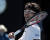 정현이 24일 멜버른에서 열린 호주오픈 테니스대회 남자단식 8강전에서 미국 테니스 샌드그렌을 꺾고 한국 테니스 사상 최초로 메이저 대회 4강전에 진출한 뒤 미소짓고 있다. [AP=연합뉴스]