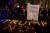 세계경제포럼이 열리는 스위스 다보스에서 23일 도널드 트럼프 대통령의 참석에 반대하는 시위대가 바닥에 &#39;트럼프 NO&#39;라는 전등을 켰다.[AP=연합뉴스]