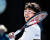 정현이 지난 24일 멜버른에서 열린 호주오픈 테니스대회 남자단식 8강전에서 미국 테니스 샌드그렌를 꺽고 한국 테니스 사상 최초로 메이저 대회 4강전에 진출한 뒤 미소짓고 있다. [멜버른 AP=연합뉴스]
