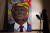 다리아 마르첸코가 지난달 31일(현지시간) 미국 뉴욕에서 트럼프 대통령 초상화 작품에 조명을 맞추고 있다. [로이터=연합뉴스]
