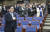 우원식 더불어민주당 원내대표(왼쪽)가 1일 오후 국회에서 열린 개헌 의원총회에서 국민의례를 하고 있다.