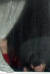 북한 예술단원으로 보이는 사람이 6일 오후 강원도 동해시 묵호항에서 만경봉 92호를 타고 입항하면서 창밖을 바라보고 있다. [연합뉴스]