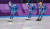 21일 강릉 스피드스케이트장에서 열린 평창동계올림픽 여자 팀추월 7-8위전에서 한국 노선영(파란색), 김보름(빨간색), 박지우(노란색)가 함께 결승선을 통과한 뒤 숨을 고르고 있다. [연합뉴스]