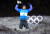 프랑스의 마르탱 푸르카드가 12일 평창 알펜시아 올림픽파크 내 바이애슬론 센터에서 열린 남자 추적 12.5km 경기 금메달을 차지한 뒤 플라워 세리머니에서 단상에 오르며 점프하고 있다. [평창=연합뉴스]