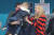 이방카 트럼프 백악관 보좌관이 지난 24일 강릉 컬링센터에서 열린 평창동계올림픽 남자컬링 미국과 스웨덴의 결승전에서 관중의 부탁으로 아기와 기념촬영을 하기위해 안고 있다.[연합뉴스]