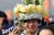 24일 2018 평창 겨울올림픽 남자 스노보드 평행대회전 결승에서 한 관람객이 이상호 선수의 별명 &#39;배추보이&#39;를 상징하는 배추 모자를 쓰고 있다. [연합뉴스]