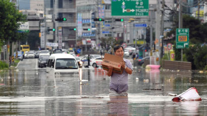 폭우 속 수해 복구하다 숨진 비정규직…1년 만에 국가유공자 될 듯