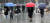 전국적으로 비가 내린 지난달 28일 학생들이 우산을 쓰고 서울 이화여대 교정을 걷고 있다. [우상조 기자]