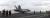 지난해 3월 14일 한반도 동남쪽 공해상에 도착한 미국 제3함대 소속의 핵항공모함인 칼빈슨호 비행갑판에 F/A-18 전투기가 이륙하고 있다. [사진공동취재단]