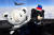 블랙이글스의 싱가포르 페리(Ferry) 전개에 평창 동계올림픽과 패럴림픽 마스코트인 수호랑, 반다비가 함께하는 모습. [사진 공군]