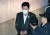 횡령 혐의로 구속기소된 최인호 변호사가 지난 12일 서울 서초동 중앙지법에서 열린 1심 선고공판에 출석하고 있다. [연합뉴스]