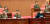 현영철(왼쪽)이 지난 2015년 4월 조선인민군 제5차 훈련일군대회에서 김정은 위원장이 연설할 때 조는 모습. [노동신문=연합뉴스]