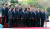문재인 대통령과 김정은 북한 국무위원장이 27일 오전 판문점에서 수행원들과 기념사진뒤 이야기를 나누고 있다.김상선 기자
