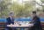 문재인 대통령(왼쪽)과 김정은 북한 국무위원장이 27일 경기도 파주 판문점 내 도보다리 끝에 있는 벤치에 앉아 단독 회담을 하고 있다. 두 정상은 이날 오후 기념식수를 한 뒤 배석자 없이 44분 동안 회담했다. [청와대사진기자단]