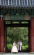봄비가 내린 2일 오후 서울 종로구 창덕궁 처마 밑에서 한복을 입은 관광객들이 비를 피하고 있다. [뉴시스]