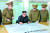김정은 북한 국무위원장(왼쪽 두번째)이 지난해 8월 전략군사령부를 시찰하면서 김락겸 전략군사령관으로부터 &#39;괌 포위사격&#39; 방안에 대한 보고를 받고있다. [사진 조선중앙통신=연합뉴스]