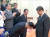 16일 시진핑 중국 국가주석과 사진촬영에 앞서 북한 대표단 중 한 명이 90도로 고개를 숙여 깎듯하게 인사하는 장면이 이날 중국중앙방송(CC-TV) 메인 뉴스에 보도됐다. [사진 CCTV 캡처]