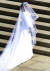 19일(현지시간) 신부 메건 마클이 결혼식장인 윈저 성의 성 조지성당으로 향하기 전 웨딩드레스를 입고 포즈를 취하고 있다. [AP=연합뉴스]