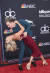 제시 메카트니가 케이티 페터슨의 허리를 젖히며 포즈를 취하고 있다. [AP=연합뉴스] 