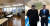 북한 개방 대비 세미나를 연 법무법인 바른(왼쪽). 오른쪽 사진은 문재인 대통령과 김정은 북한 국무위원장의 도보다리 담화 [사진 법무법인 바른, 중앙포토]
