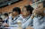지난 28일 대구스타디움 기자석에서 미냐노(가운데) 코치가 헤드셋을 착용하고 경기를 지켜보고 있다.[대한축구협회]