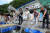지난해 8월 4일 강원 양구군 양구선착장에서 어린 뱀장어와 쏘가리를 소양호에 방류하는 행사가 열리고 있다. [양구군 제공=연합뉴스] 